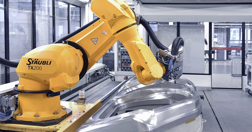 Robot-assisted machining of molds with TX200